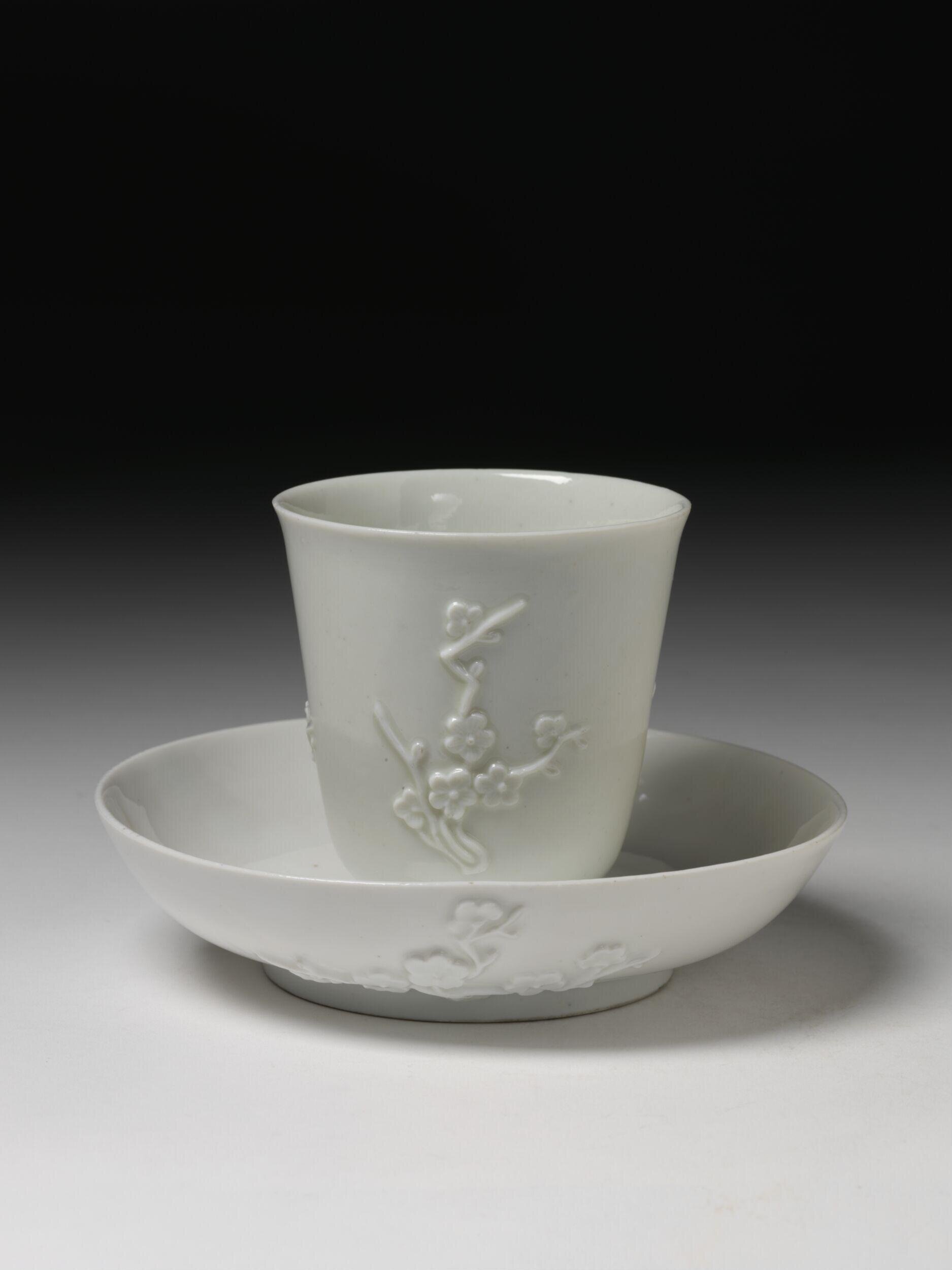 Meissen prunus beaker and saucer, hard-paste porcelain, c. 1726-1727, V&A C.450&A-1922 — Blanc de Chine imitation virtually indistinguishable from original