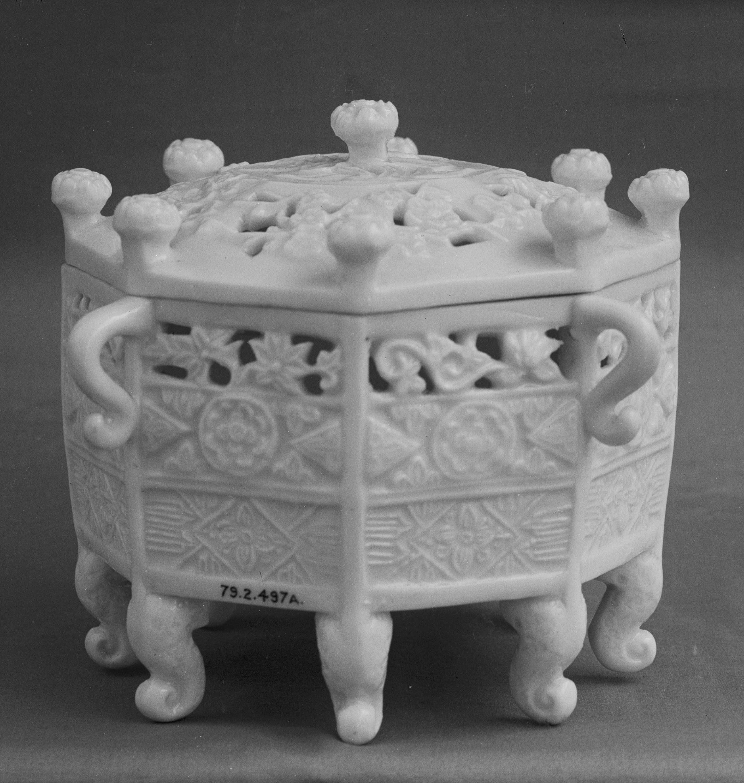 Dehua white porcelain covered incense burner, early 18th century, The Metropolitan Museum of Art — warm white tone from low-iron clay under oxidising atmosphere, Blanc de Chine ivory white